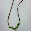 Necklace made by a patient at Wolfson Children's Hospital with the assistance of Art with a Heart contract artist Tracie Thornton.